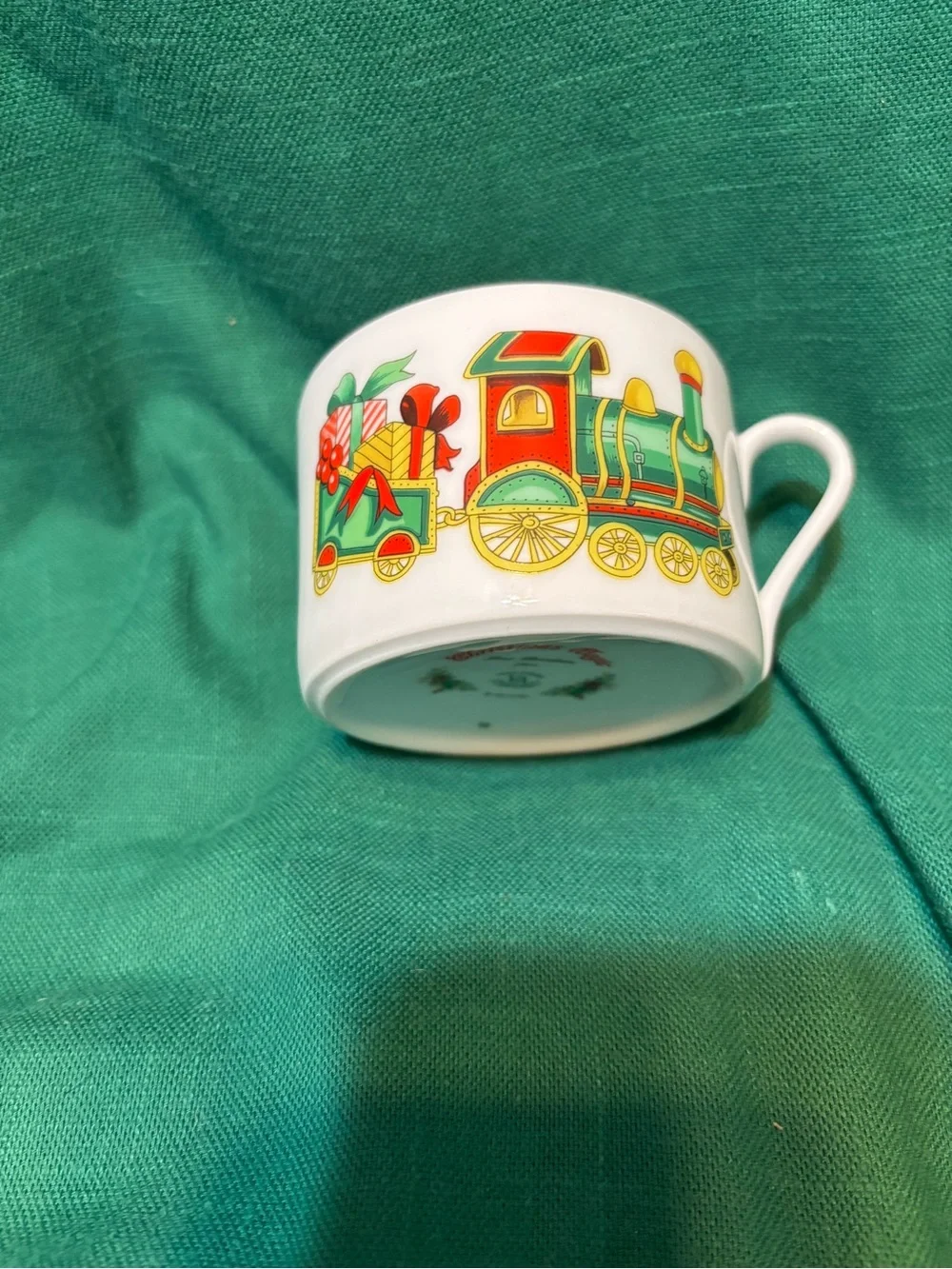 Vista Alegre Christmas Magic Cup and Saucer with Train Pulling Gifts